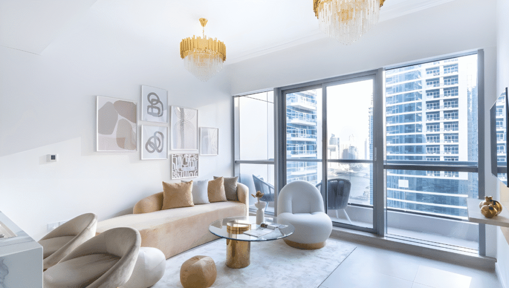 Modern luxury living room with panoramic city skyline view through floor-to-ceiling windows, contemporaModern luxury living room with panoramic city skyline view through floor-to-ceiling windows, contemporary furniture, and golden chandelierry furniture, and golden chandelier