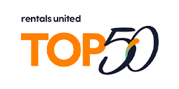 Top 50 achievement badge from Rentals United featuring orange and black logo design on transparent background